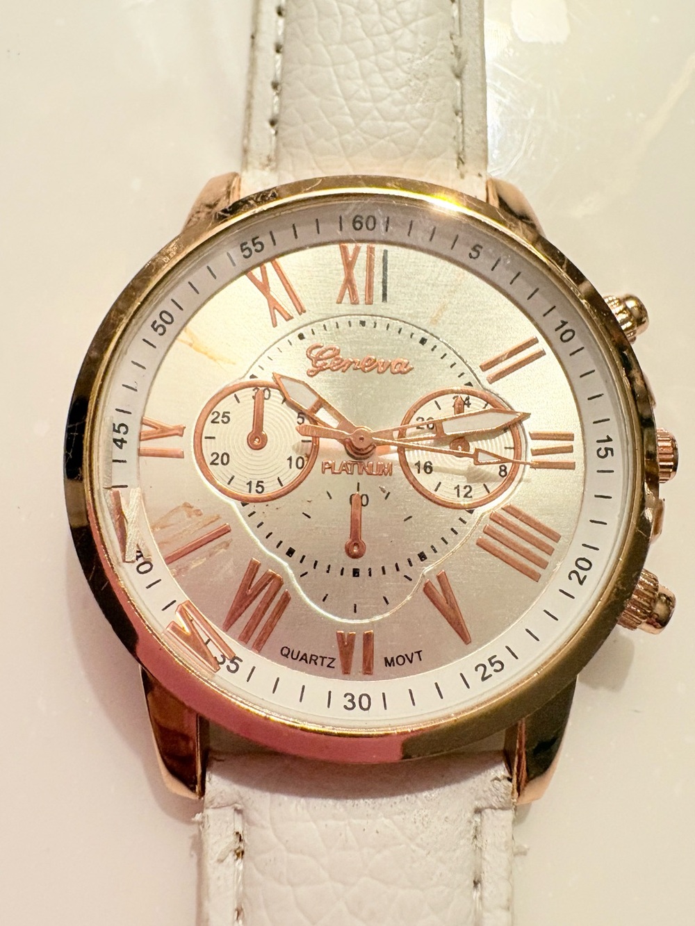 Geneva Platinum Rose Gold
Tone Quartz Watch with White
Strap - Roman Numerals